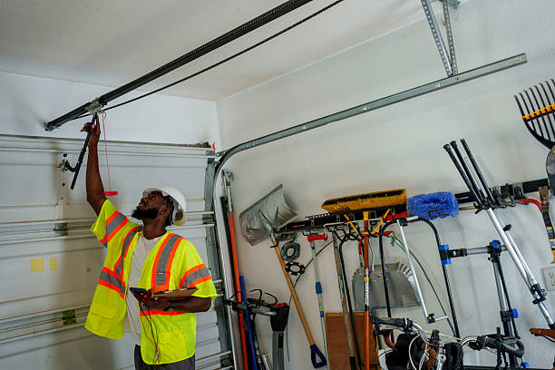 Professional Garage Door Panel Replacement technician working in Broome County County, NY
